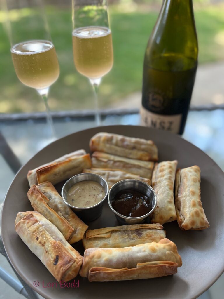 egg rolls and Jansz sparkling rosé